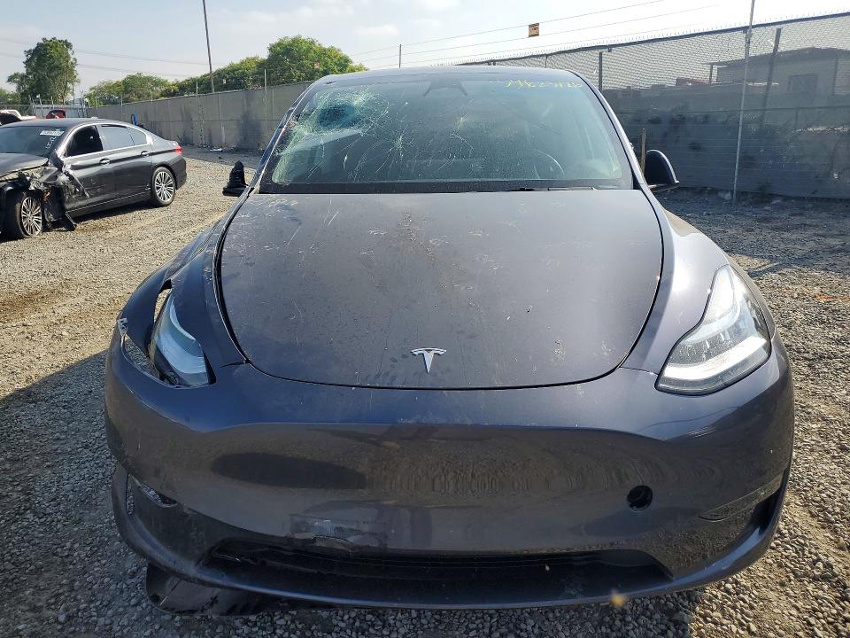 2023 Tesla Model y VIN 7SAYGAEEXPF599058 COPART salvage auction — FRONT END, Ca - Salvage Certificate, sold $9,200 on 2026-07-28 (photo 5)