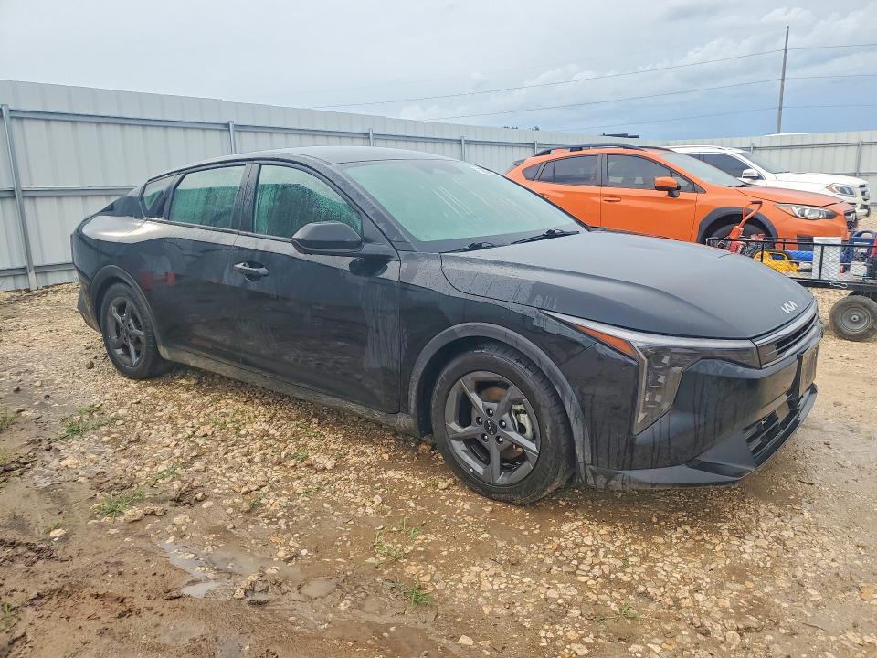 2025 Kia K4 VIN 3KPFT4DE1SE053542 COPART salvage auction — WATER/FLOOD, Tx - Salvage Title-Flood Damage, sold $4,350 on 2026-07-09 (photo 4)