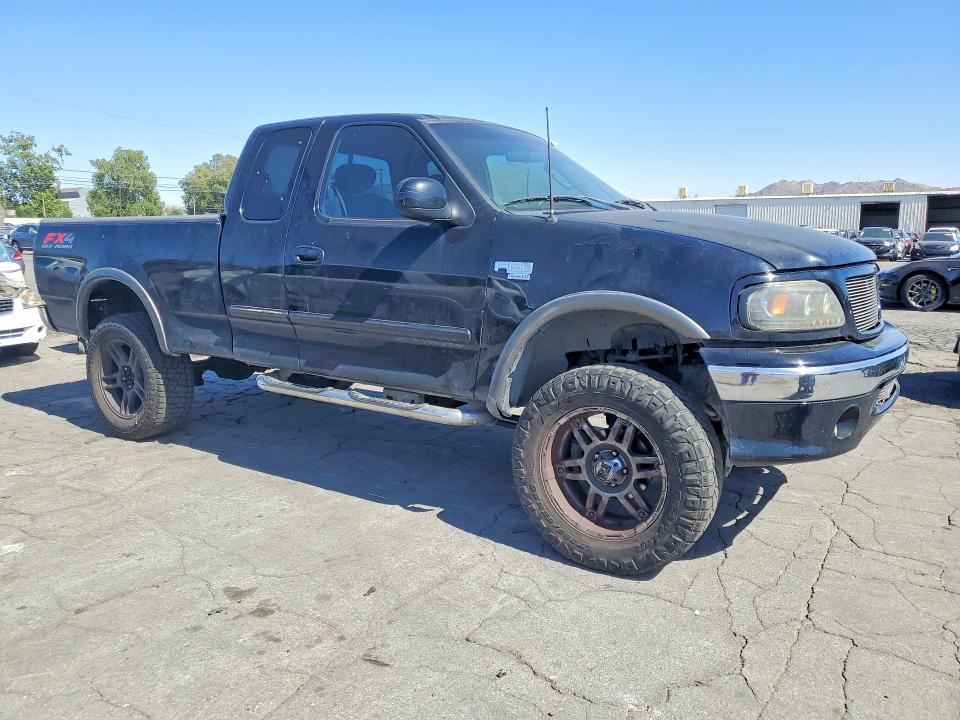 2002 Ford F-150 lightning VIN 1FTRX18L82NB46286 COPART salvage auction — MINOR DENT/SCRATCHES, CA - SALVAGE CERTIFICATE, sold $625 on 2026-07-09 (photo 4)