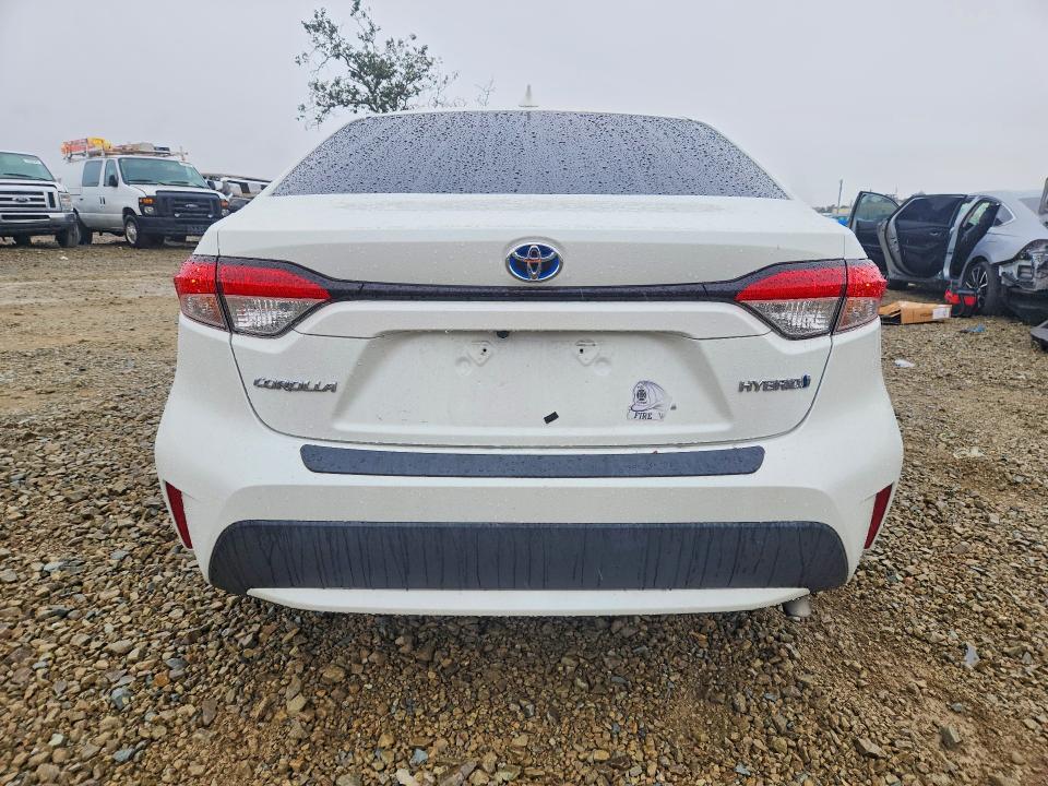 2021 Toyota Corolla VIN JTDEAMDE0MJ015498 COPART salvage auction — SIDE, Ca - Salvage Certificate, sold $5,100 on 2026-07-07 (photo 6)