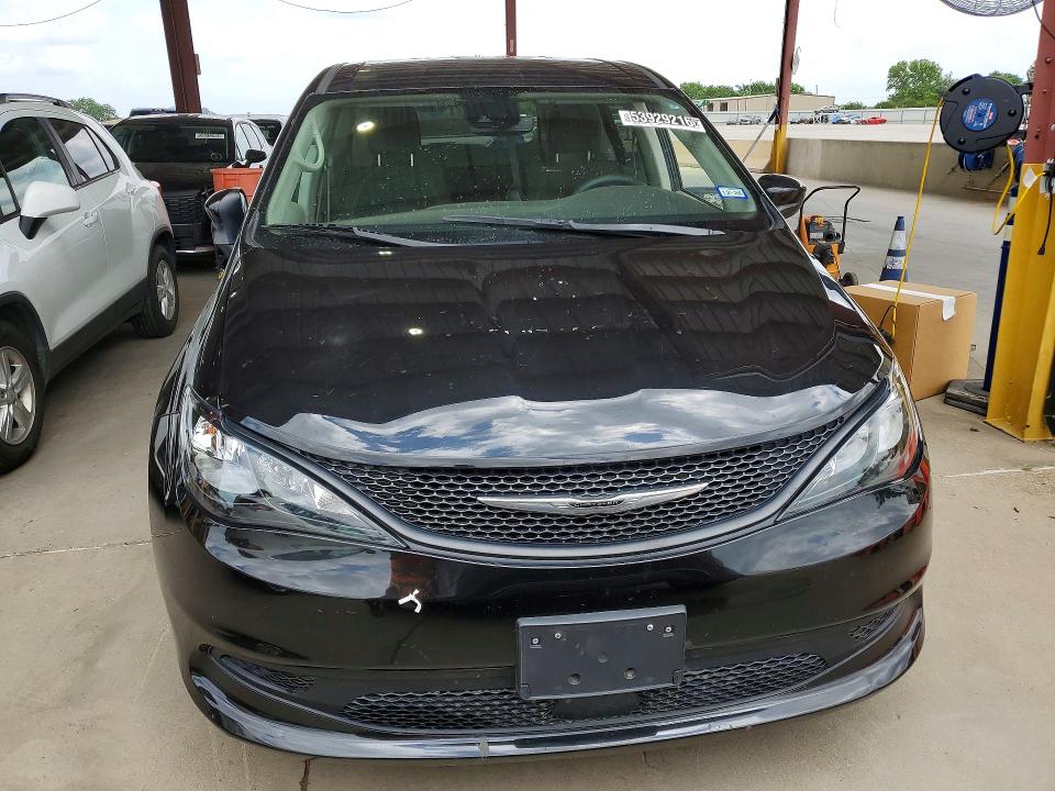 2023 Chrysler Voyager VIN 2C4RC1CG2PR511545 COPART salvage auction — MINOR DENT/SCRATCHES, TX - NONREPAIRABLE TITLE, sold $13,700 on 2026-07-30 (photo 5)