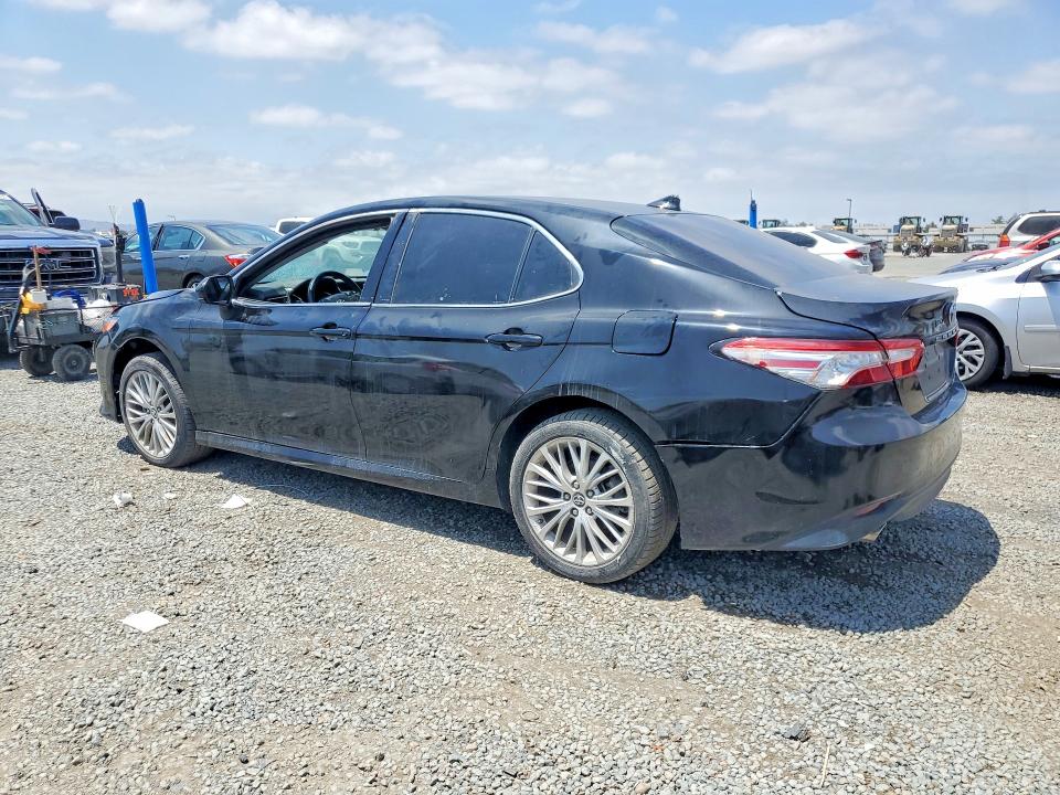 2019 Toyota Camry hybrid VIN 4T1B21HK7KU516393 COPART salvage auction — FRONT END, In - Dis/Dlr/Exp Only Clean Title, sold $10,800 on 2026-07-15 (photo 2)