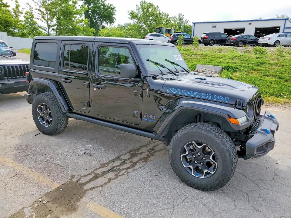 2023 Jeep Wrangler / VIN 1C4JJXR67PW554824 COPART salvage auction — MINOR DENT/SCRATCHES, Mo - Certificate Of Title, sold $24,250 on 2026-07-02 (photo 4)
