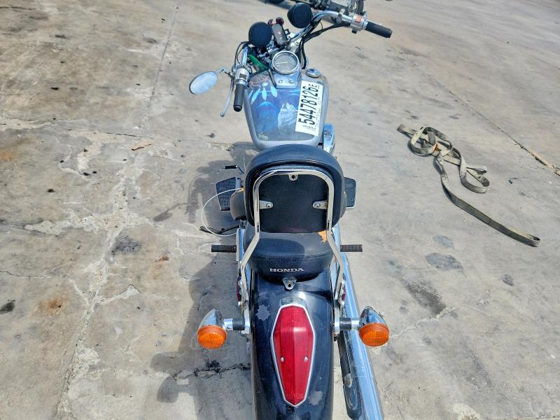 2005 Honda Vt750 VIN JH2RC50325M102249 COPART salvage auction — SIDE, Tx - Salvage Vehicle Title, sold $250 on 2026-07-30 (photo 6)