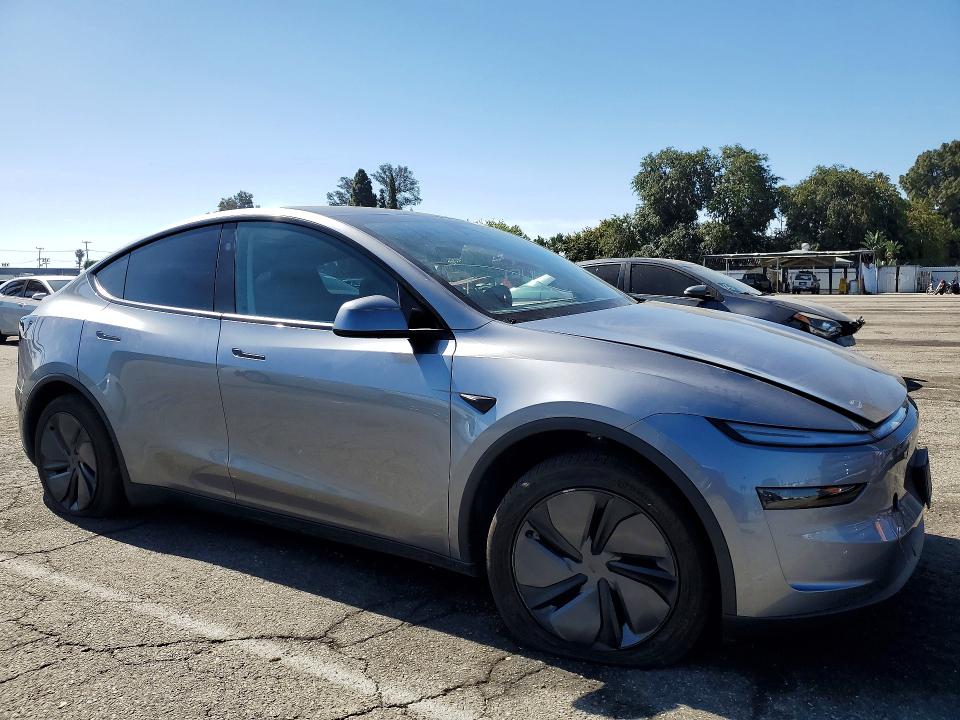 2026 Tesla Model y VIN 7SAYGDED7TF416136 COPART salvage auction — SIDE, Ca - Salvage Certificate, sold $18,000 on 2026-07-17 (photo 4)