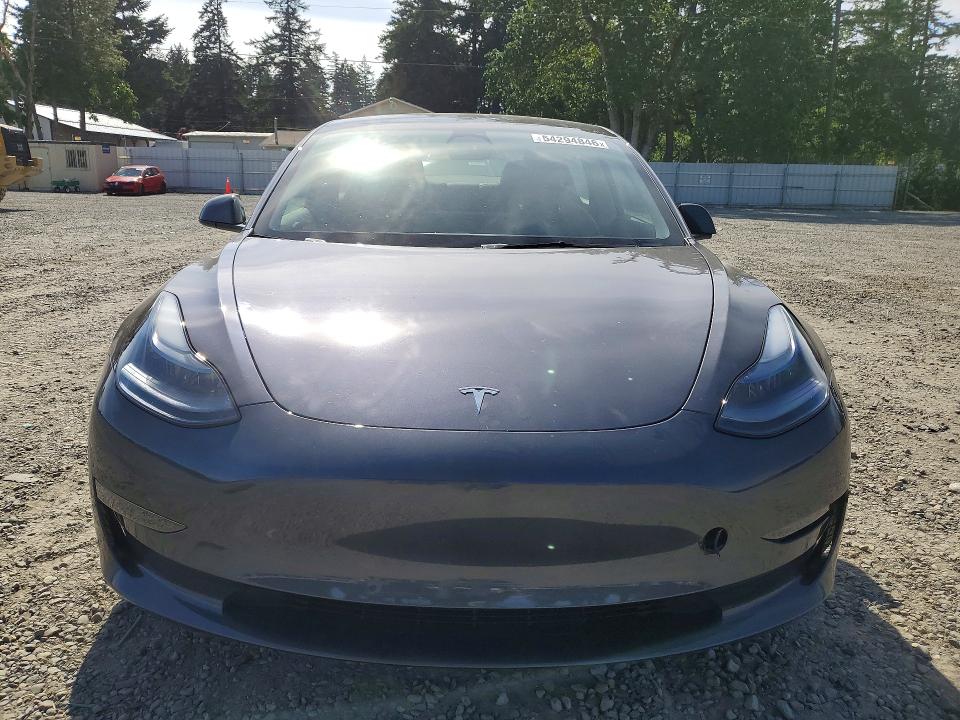 2023 Tesla Model 3 VIN 5YJ3E1EA4PF701982 COPART salvage auction — SIDE, Salvage Title, sold $7,800 on 2026-07-10 (photo 5)