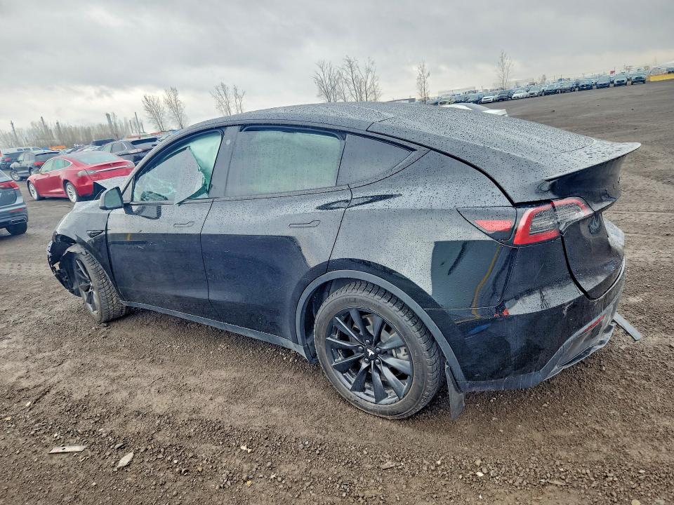 2023 Tesla Model y VIN LRWYGDFD4PC939125 COPART salvage auction — FRONT END, Qc - Gravement Accidente, sold $6,800 on 2026-07-07 (photo 2)