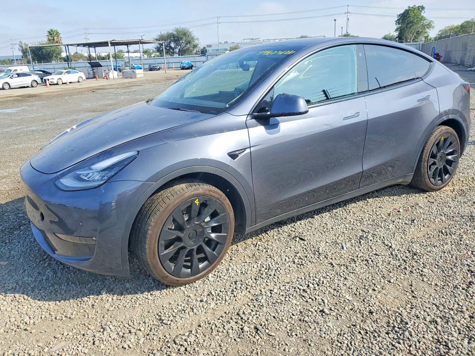 2023 Tesla Model y VIN 7SAYGAEEXPF599058 COPART salvage auction — FRONT END, Ca - Salvage Certificate, sold $9,200 on 2026-07-28 (photo 1)
