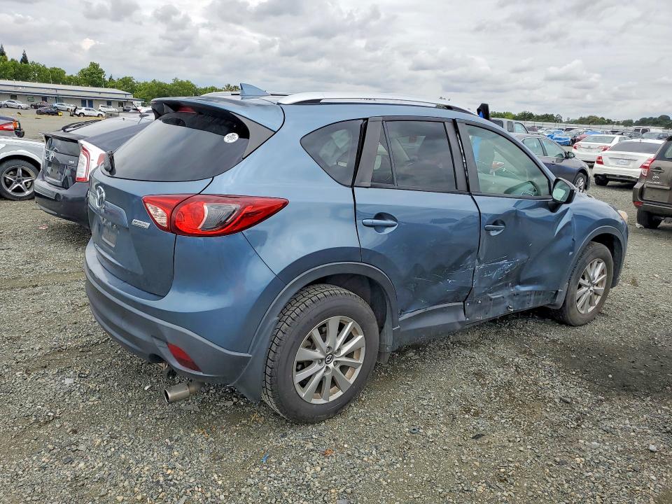 2016 Mazda VIN JM3KE2CY2G0792967 COPART salvage auction — SIDE, Ca - Salvage Certificate, sold $4,000 on 2026-07-02 (photo 3)