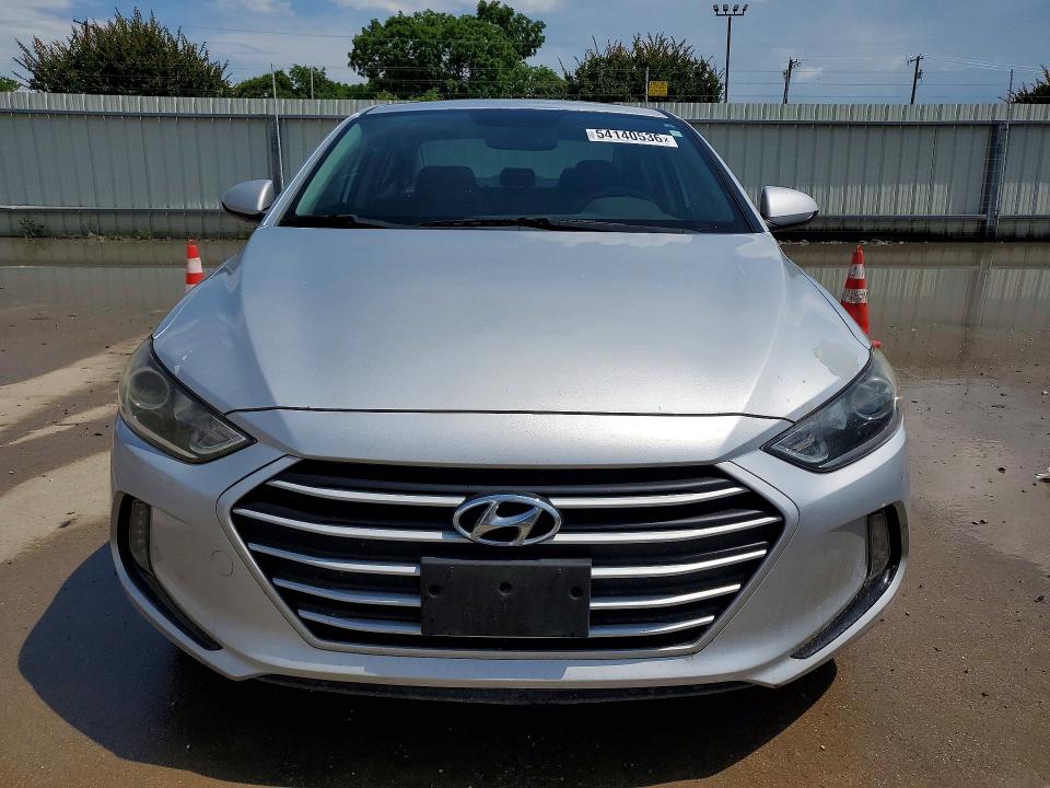 2018 Hyundai Elantra VIN KMHD84LF4JU586161 COPART salvage auction — SIDE, Tx - Salvage Vehicle Title, sold $4,750 on 2026-07-23 (photo 5)