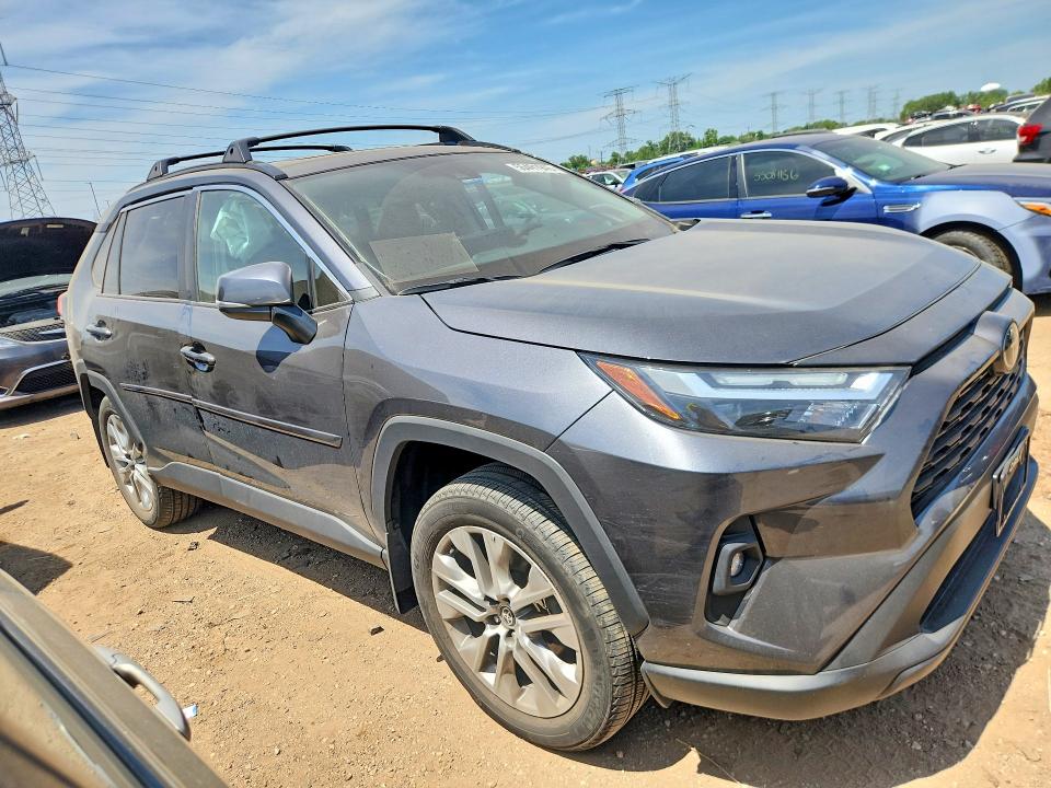 2023 Toyota Rav 4 VIN 2T3A1RFV6PC353861 COPART salvage auction — SIDE, Wv - Salvage Certificate, sold $15,100 on 2026-07-30 (photo 4)
