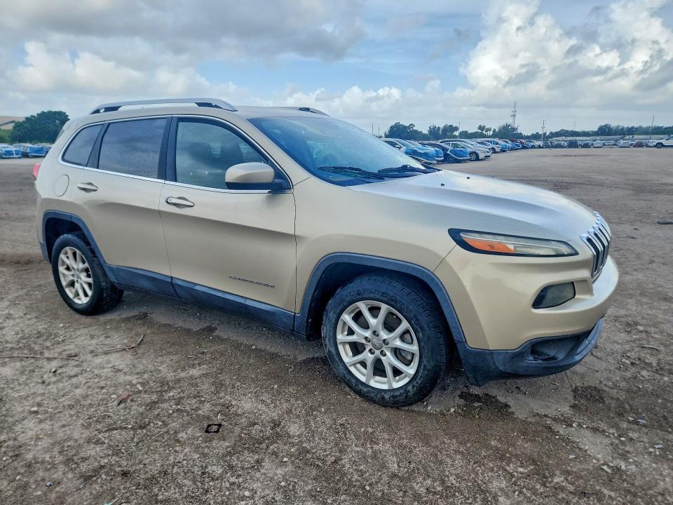 2014 Jeep Cherokee VIN 1C4PJLCB8EW252934 COPART salvage auction — MINOR DENT/SCRATCHES, Fl - Certificate Of Title (P), sold $500 on 2026-07-09 (photo 4)