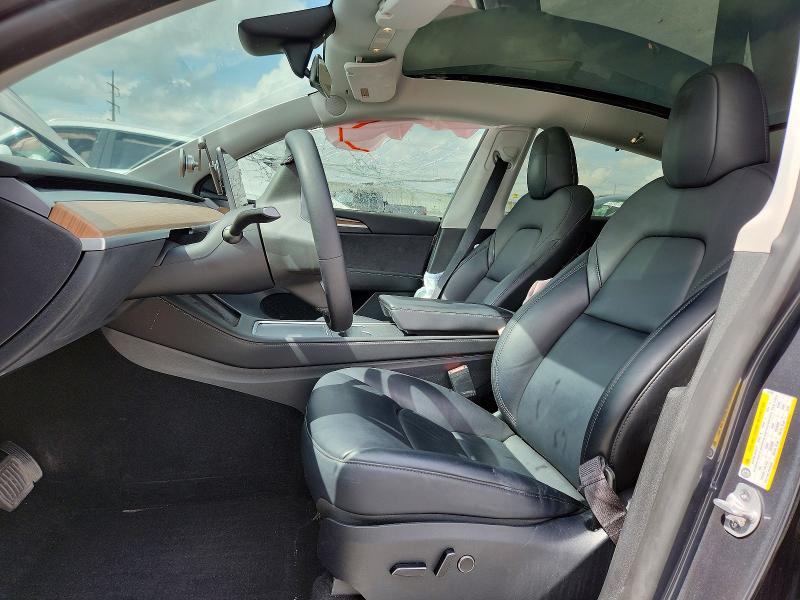 2023 Tesla Model y VIN 7SAYGDEE5PF833902 COPART salvage auction — SIDE, Tx - Salvage Vehicle Title, sold $200 on 2026-07-21 (photo 7)