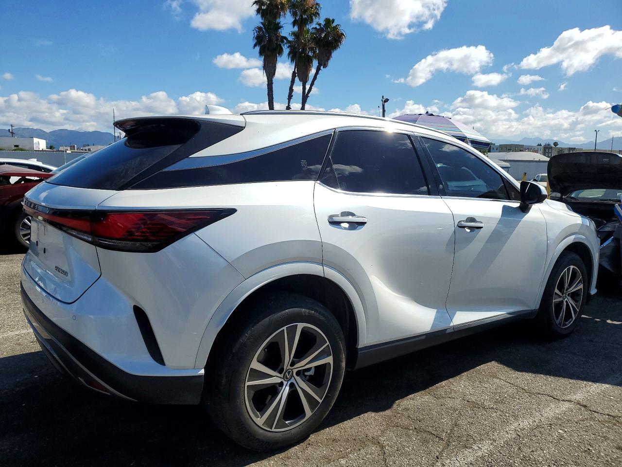 2024 Lexus RX 350 VIN JTJCHMAA7R2017221 COPART salvage auction — Side, CA - SALVAGE CERTIFICATE, sold $25,750 on 2026-07-10 (photo 3)