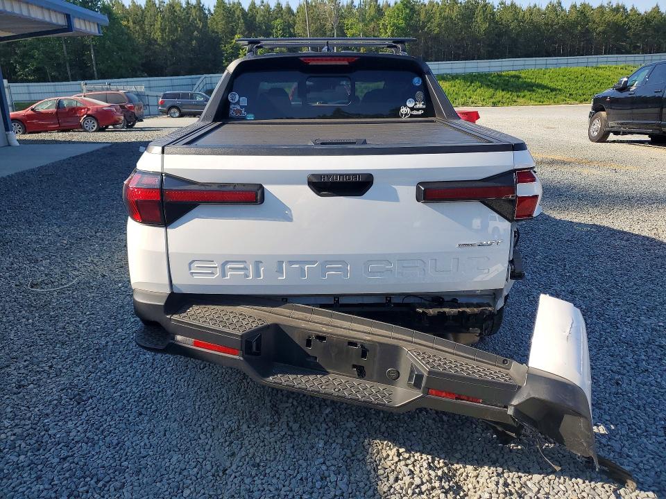 2023 Hyundai Santa cruz VIN 5NTJDDAF5PH054296 COPART salvage auction — REAR END, Nc - Salvage Certificate Of Title, sold $10,500 on 2026-07-02 (photo 6)
