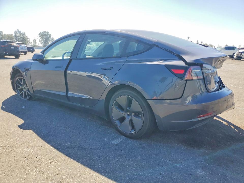 2023 Tesla Model 3 VIN 5YJ3E1EA1PF506812 COPART salvage auction — REAR END, Ca - Salvage Certificate, sold $4,250 on 2026-07-28 (photo 2)