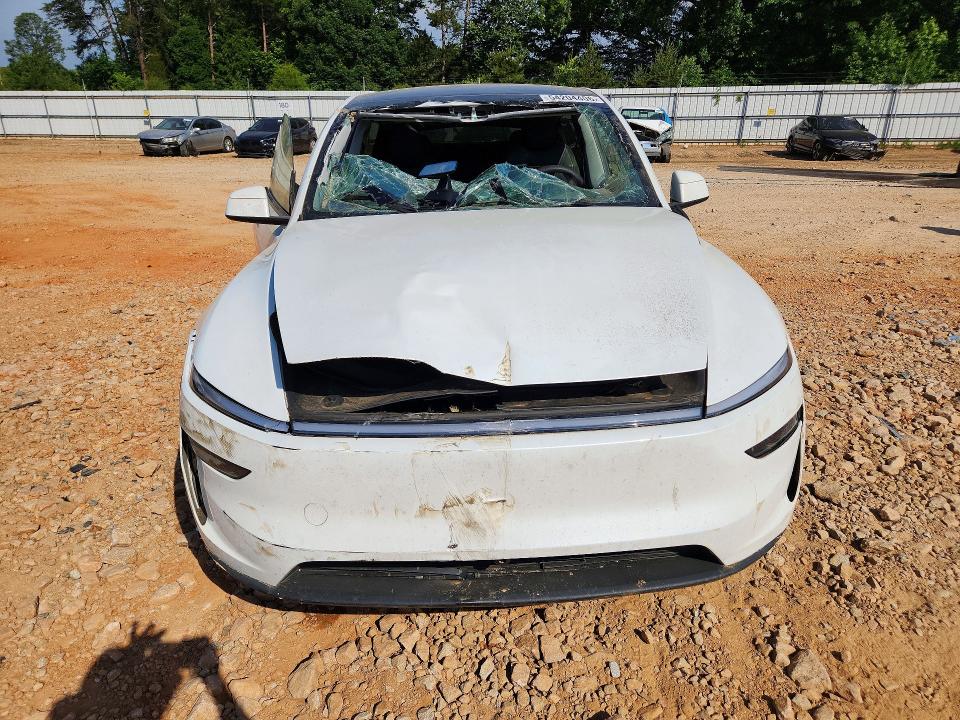 2026 Tesla VIN 7SAYGDED1TA431518 COPART salvage auction — WATER/FLOOD, Nc - Salvage Certificate Of Title, sold $1,700 on 2026-07-27 (photo 5)