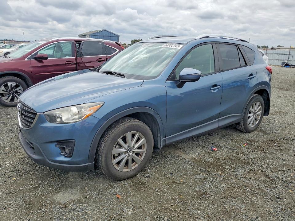 2016 Mazda VIN JM3KE2CY2G0792967 COPART salvage auction — SIDE, Ca - Salvage Certificate, sold $4,000 on 2026-07-02 (photo 1)