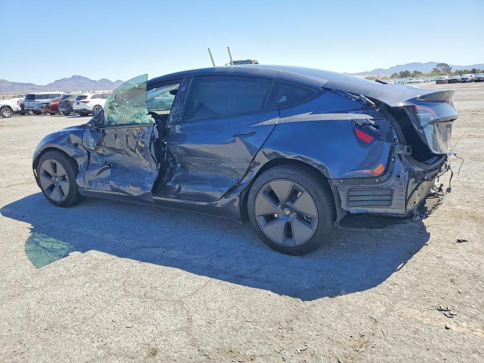 2023 Tesla Model 3 VIN 5YJ3E1EA9PF707938 COPART salvage auction — SIDE, Nv - Salvage Title, sold $4,050 on 2026-07-23 (photo 2)