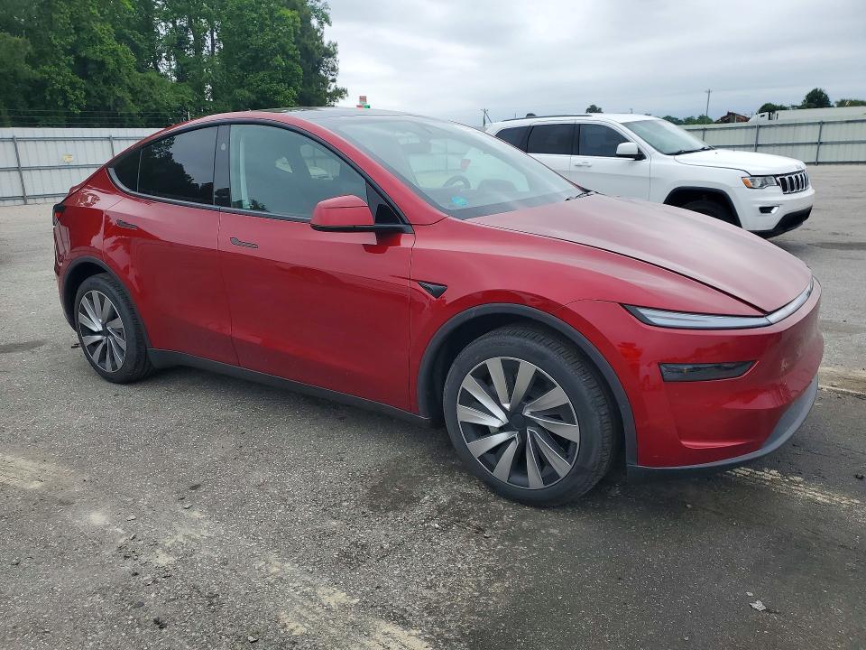 2026 Tesla Model y VIN 7SAYGDED5TA451660 COPART salvage auction — REAR END, Nc - Salvage Certificate Of Title, sold $20,300 on 2026-07-28 (photo 4)