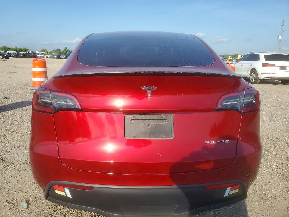 2024 Tesla Model y VIN 7SAYGDEF7RA313080 COPART salvage auction — SIDE, Tx - Salvage Vehicle Title, sold $11,600 on 2026-07-13 (photo 6)