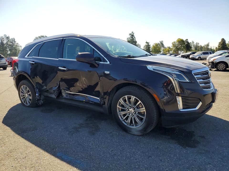 2018 Cadillac VIN 1GYKNCRS1JZ235076 COPART salvage auction — SIDE, Ca - Salvage Certificate, sold $2,700 on 2026-07-02 (photo 4)