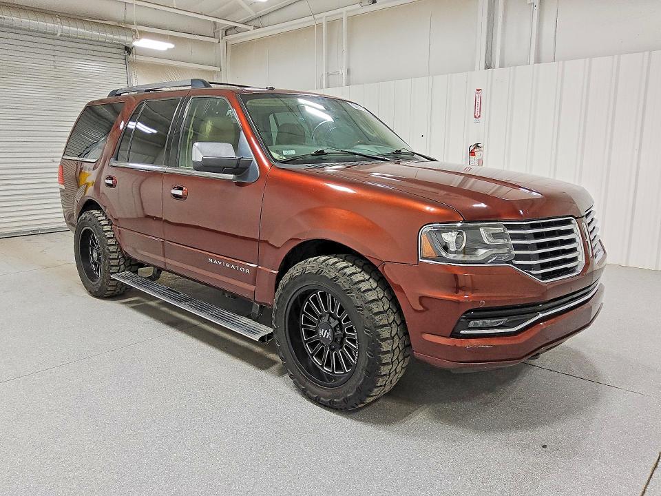 2015 Lincoln townhouse Navigator VIN 5LMJJ2JT5FEJ10410 COPART salvage auction — NORMAL WEAR, WV - CERTIFICATE OF TITLE, sold $2,500 on 2026-07-07 (photo 4)