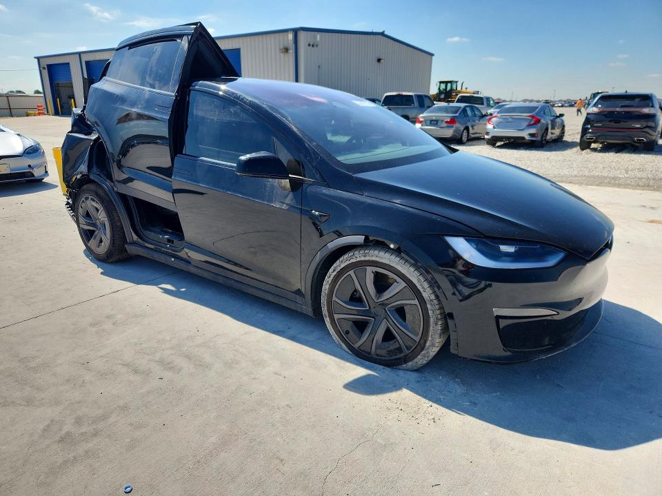 2026 Tesla VIN 7SAXCAE59TF476269 COPART salvage auction — REAR END, Tx - Certificate Of Title, sold $17,600 on 2026-09-08 (photo 4)