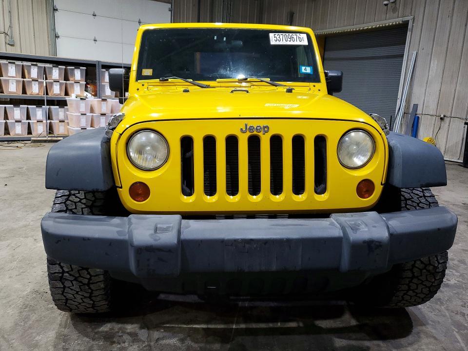 2009 Jeep Wrangler / VIN 1J4FA24129L741679 COPART salvage auction — SIDE, NH - CERT OF TITLE-SALVAGE, sold $925 on 2026-07-02 (photo 5)
