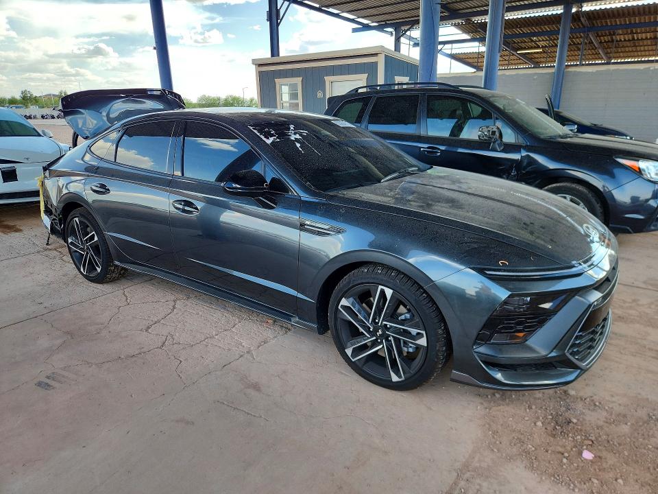 2026 Hyundai VIN KMHL54JC0TA560741 COPART salvage auction — REAR END, Az - Cert Of Title - Salvage, sold $7,700 on 2026-07-09 (photo 4)