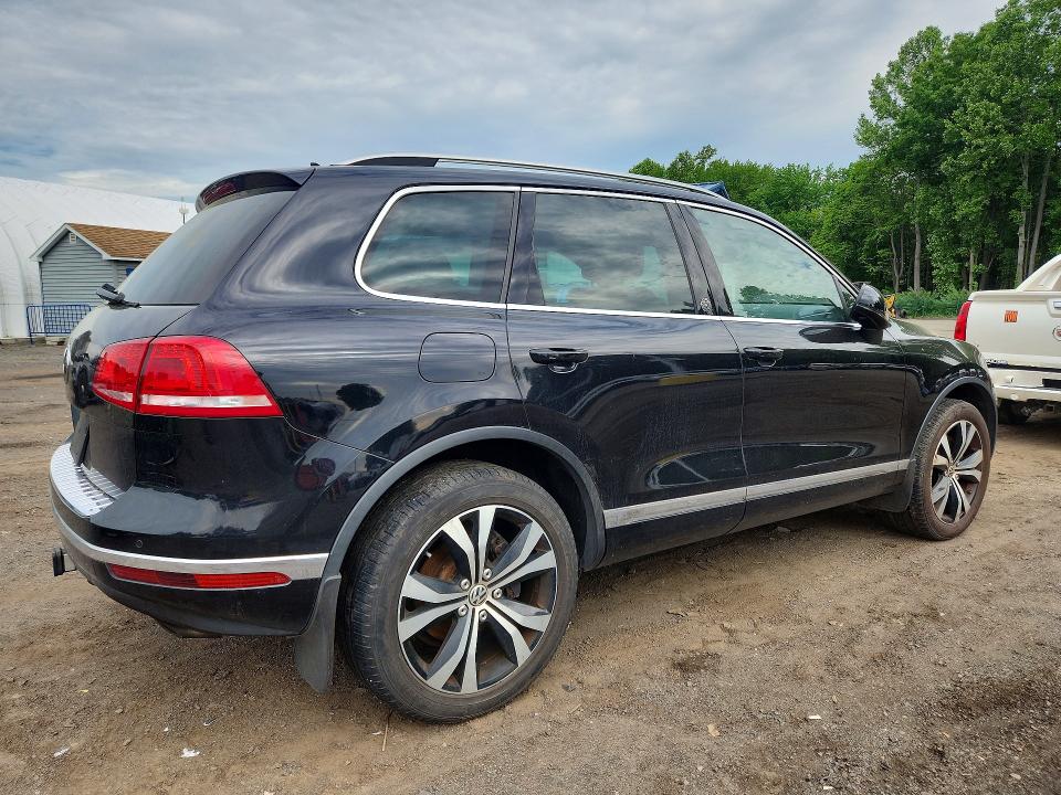 2017 Volkswagen Touareg VIN WVGRF7BP9HD000586 COPART salvage auction — MINOR DENT/SCRATCHES, Mi - Certificate Of Title, sold $3,850 on 2026-07-09 (photo 3)