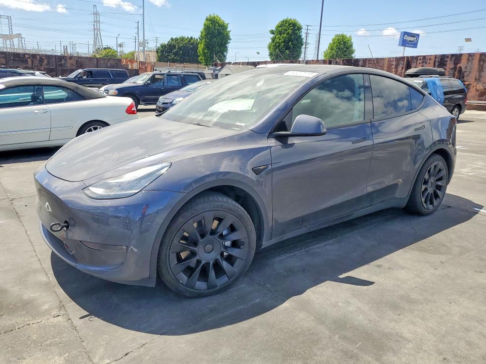 2023 Tesla Model y VIN 7SAYGDEE8PA113412 COPART salvage auction — MINOR DENT/SCRATCHES, Ca - Salvage Certificate, sold $14,100 on 2026-07-15 (photo 1)