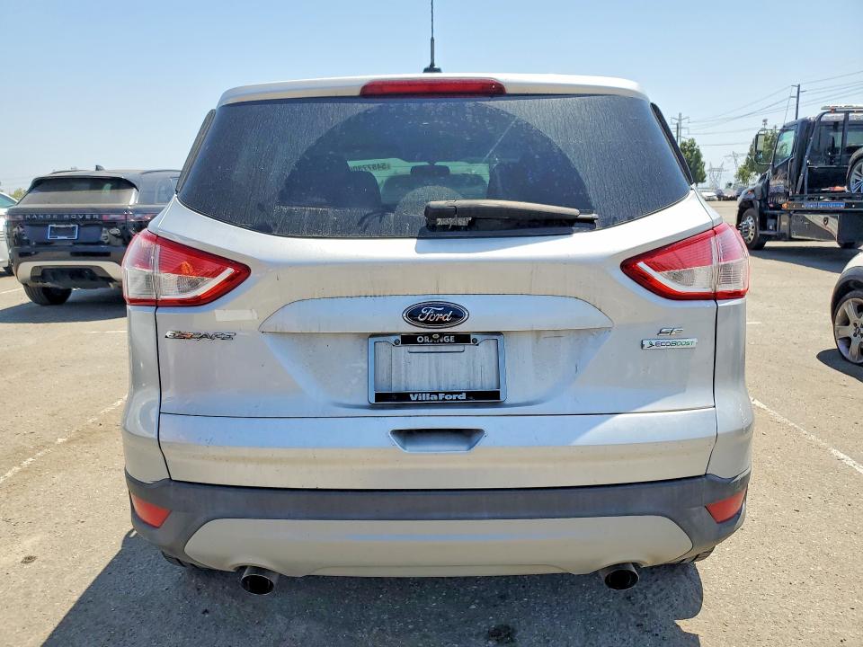 2014 Ford Escape VIN 1FMCU0G98EUA70928 COPART salvage auction — MINOR DENT/SCRATCHES, Ca - App For Dup Salvage Or Ac, sold $625 on 2026-07-02 (photo 6)