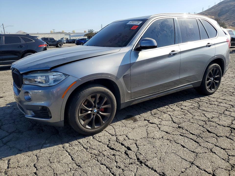 2014 BMW X5 VIN 5UXKR2C57E0C00447 — COPART salvage auction photo
