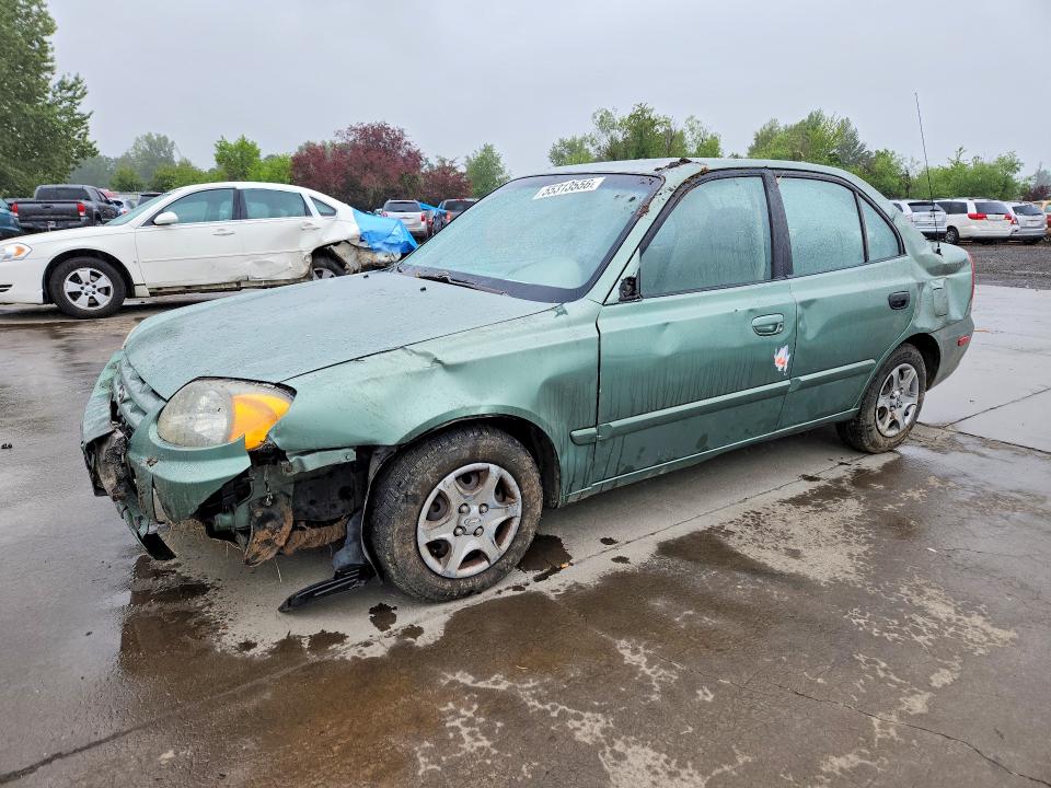 2005 Hyundai Accent VIN KMHCG45C35U585400 COPART salvage auction — ROLLOVER, Or - Salvage Title Certificate, sold $150 on 2026-07-27 (photo 1)