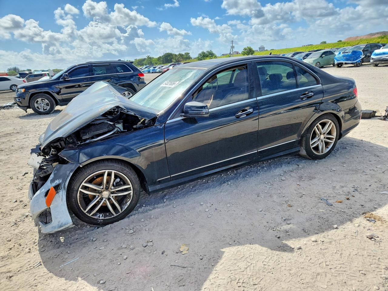 2014 Mercedes-Benz C-Class VIN WDDGF4HBXEG233768 — COPART salvage auction photo