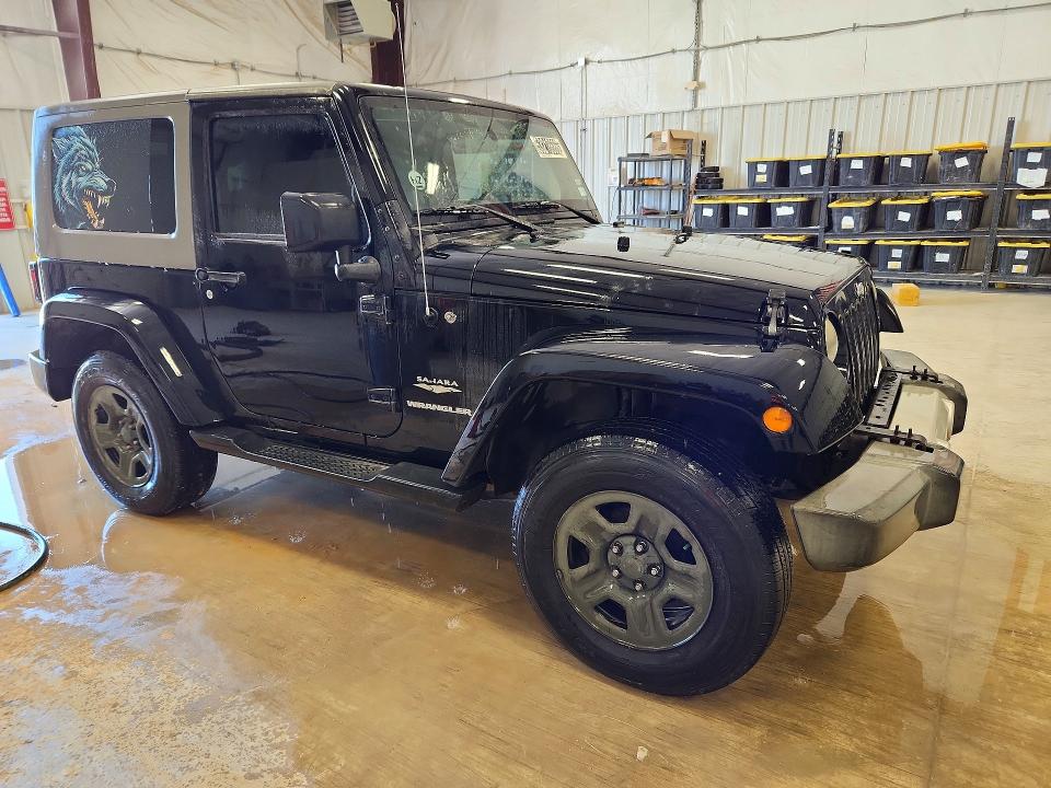 2010 Jeep Wrangler / VIN 1J4AA5D19AL158512 COPART salvage auction — MINOR DENT/SCRATCHES, Tx - Certificate Of Title, sold $3,200 on 2026-07-07 (photo 4)