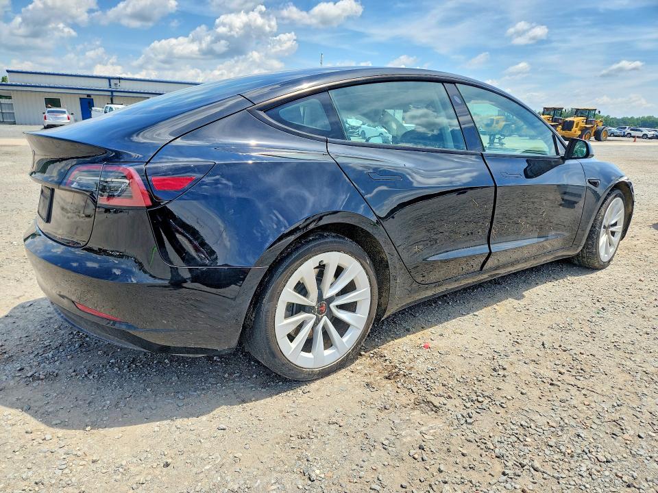 2023 Tesla Model 3 VIN 5YJ3E1EA9PF616085 COPART salvage auction — SIDE, Nc - Salvage Certificate Of Title, sold $7,000 on 2026-07-27 (photo 3)