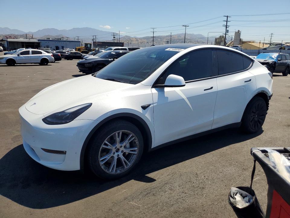 2023 Tesla VIN 7SAYGDEE4PF852893 COPART salvage auction — REAR END, Ca - Salvage Certificate, sold $14,600 on 2026-07-15 (photo 1)