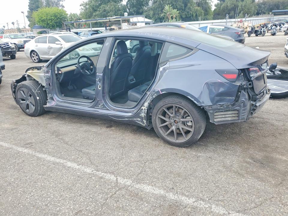 2023 Tesla Model 3 VIN 5YJ3E1EAXPF429115 COPART salvage auction — SIDE, ID - SALVAGE CERTIFICATE OF TITLE, sold $6,700 on 2026-07-31 (photo 2)