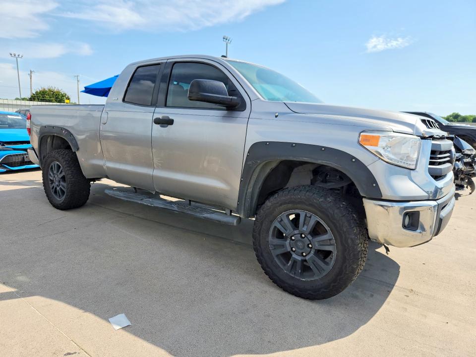 2014 Toyota Tundra VIN 5TFRM5F13EX077193 COPART salvage auction — SIDE, Tx - Salvage Vehicle Title, sold $4,650 on 2026-07-09 (photo 4)