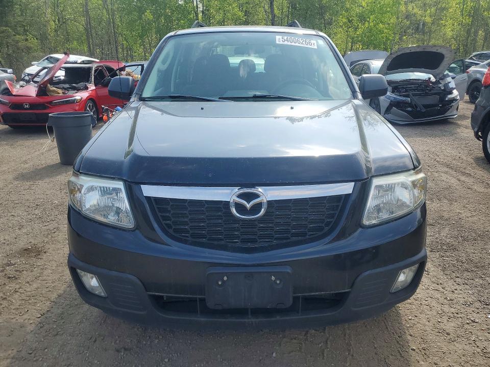 2011 Mazda Tribute VIN 4F2CY0C71BKM00946 COPART salvage auction — MINOR DENT/SCRATCHES, On - Permit No Brand - Unfit, sold $750 on 2026-07-03 (photo 5)