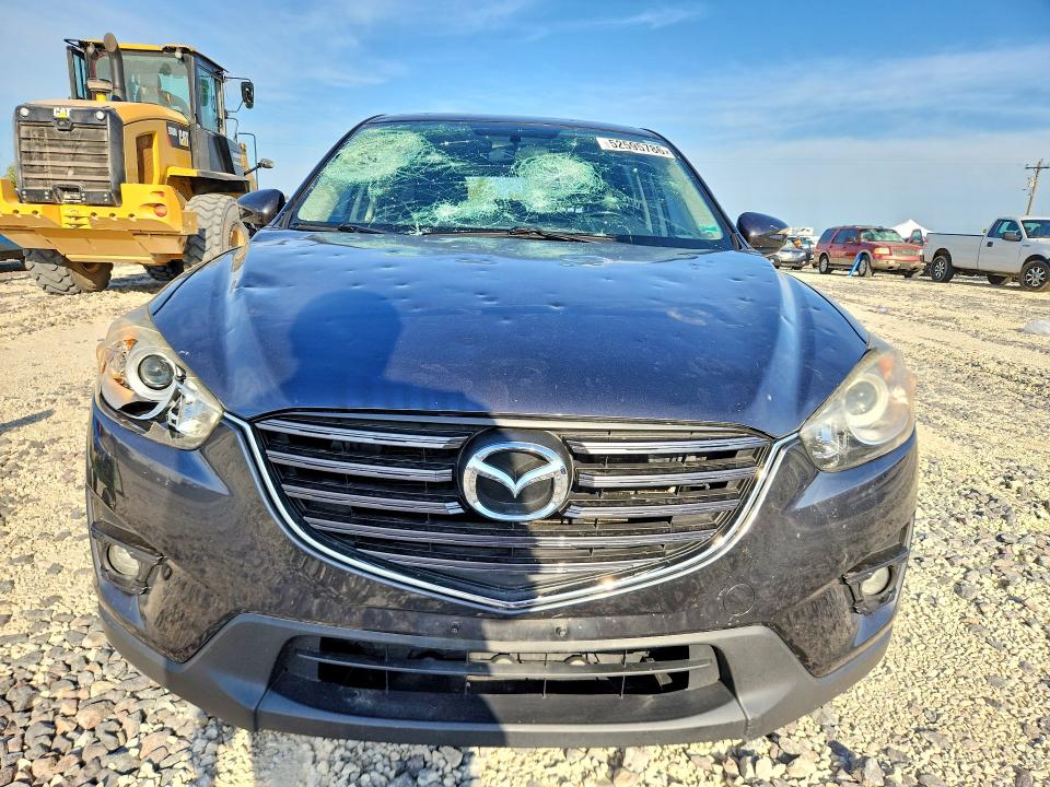 2016 Mazda Cx-5 VIN JM3KE4CY2G0782175 COPART salvage auction — HAIL, Mo - Salvage Certificate Of Title, sold $2,850 on 2026-07-27 (photo 5)
