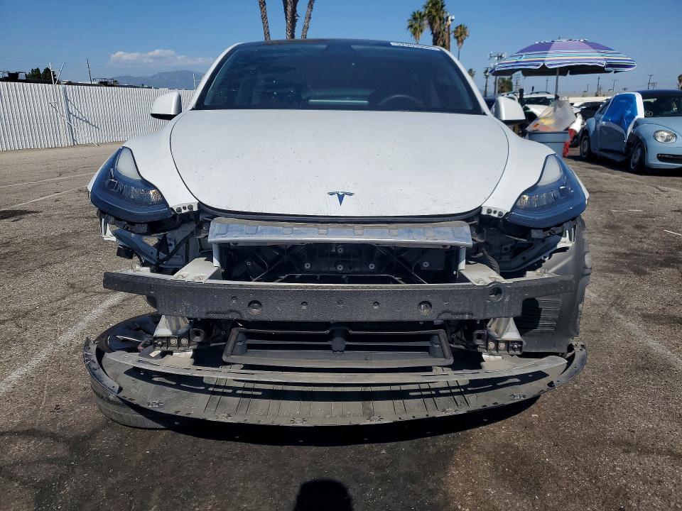 2023 Tesla Model y VIN 7SAYGDEE7PA030635 COPART salvage auction — FRONT END, Ca - Salvage Certificate, sold $13,700 on 2026-07-24 (photo 5)