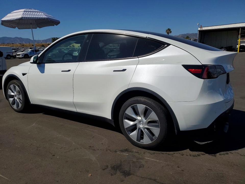 2023 Tesla Model y VIN 7SAYGDEE5PA149347 COPART salvage auction — REAR END, Ca - Salvage Certificate, sold $14,100 on 2026-07-06 (photo 2)