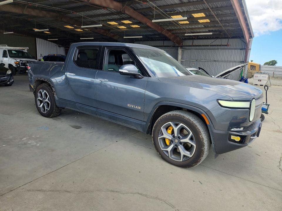 2022 Rivian VIN 7FCTGAAA9NN013484 COPART salvage auction — REAR END, Ca - Salvage Certificate, sold $16,700 on 2026-07-13 (photo 4)