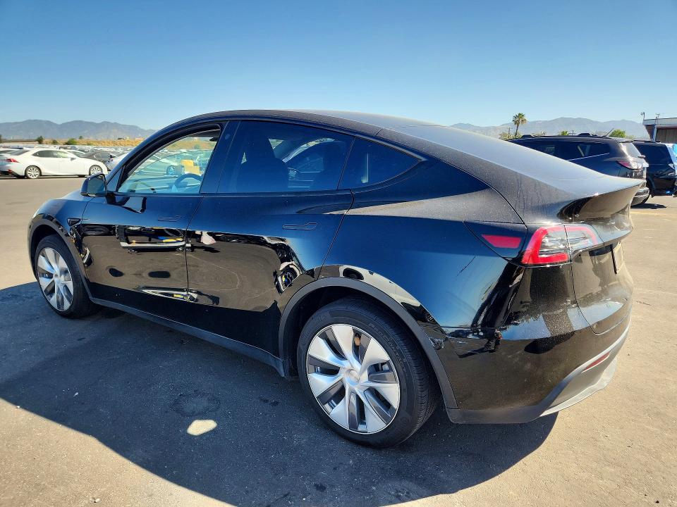 2023 Tesla Model 3 VIN 7SAYGDEE0PA061595 COPART salvage auction — SIDE, Salvage Title, sold $250 on 2026-08-03 (photo 2)