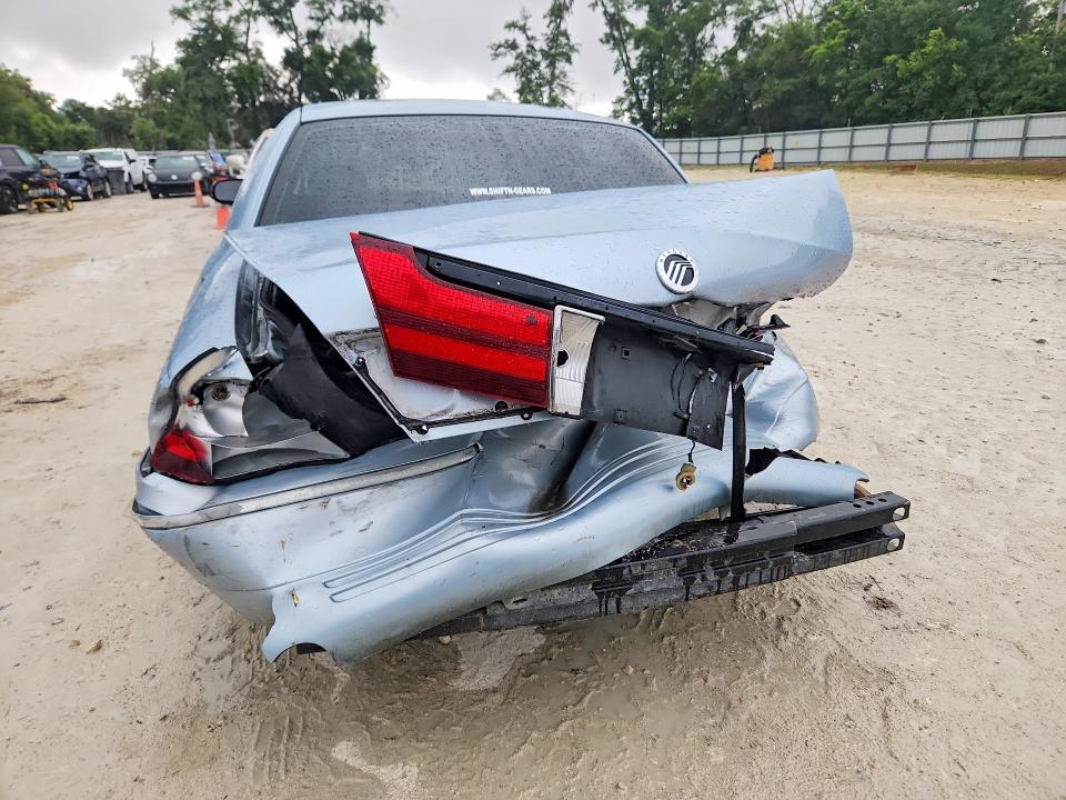 2003 Mercury Grand marquis VIN 2MEFM74W13X645668 COPART salvage auction — FRONT END, Fl - Cert Of Title Slvg Rebuildable, sold $250 on 2026-07-28 (photo 6)