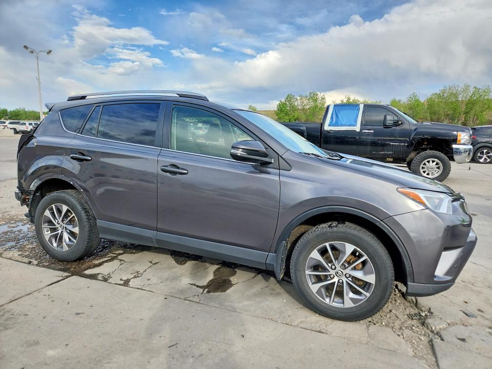 2016 Toyota Rav 4 VIN JTMRJREV5GD039697 COPART salvage auction — REAR END, Co - Public - Salvage Title, sold $275 on 2026-07-29 (photo 4)