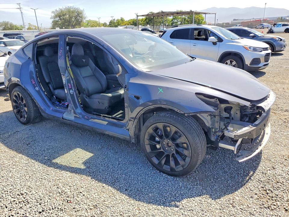 2023 Tesla Model y VIN 7SAYGDEE2PA196481 COPART salvage auction — SIDE, CA - SALVAGE CERTIFICATE, sold $5,900 on 2026-07-28 (photo 4)